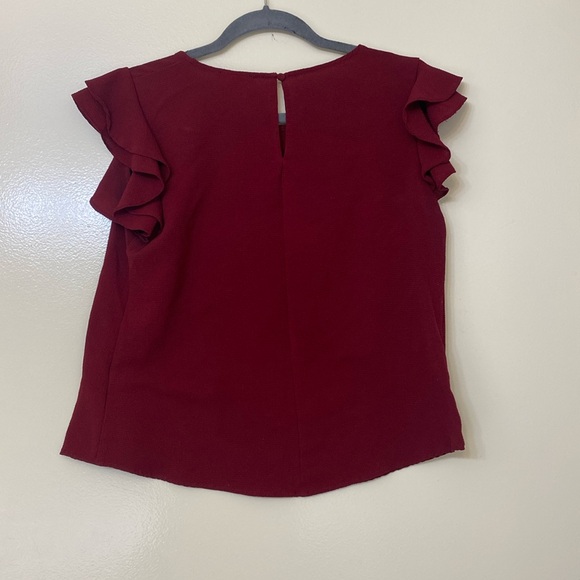 Sleeveless burgundy round hem blouse - Picture 3 of 3